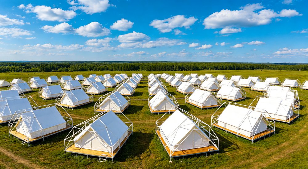 Humanitarian relief tent photographed at aid distribution camp providing reliable shelter with strong steel framework quality stitching and weather resistant fabric for disaster affected communities