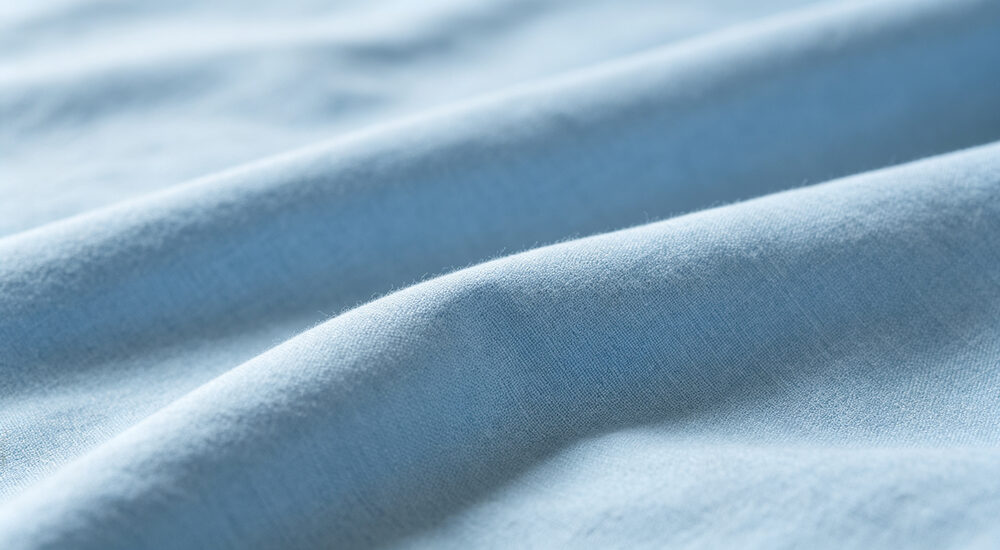 Institutional bedding product display showing material quality and design details for commercial procurement decision making suitable for emergency shelters hospitals universities and hotels requiring durable comfortable bedding solutions